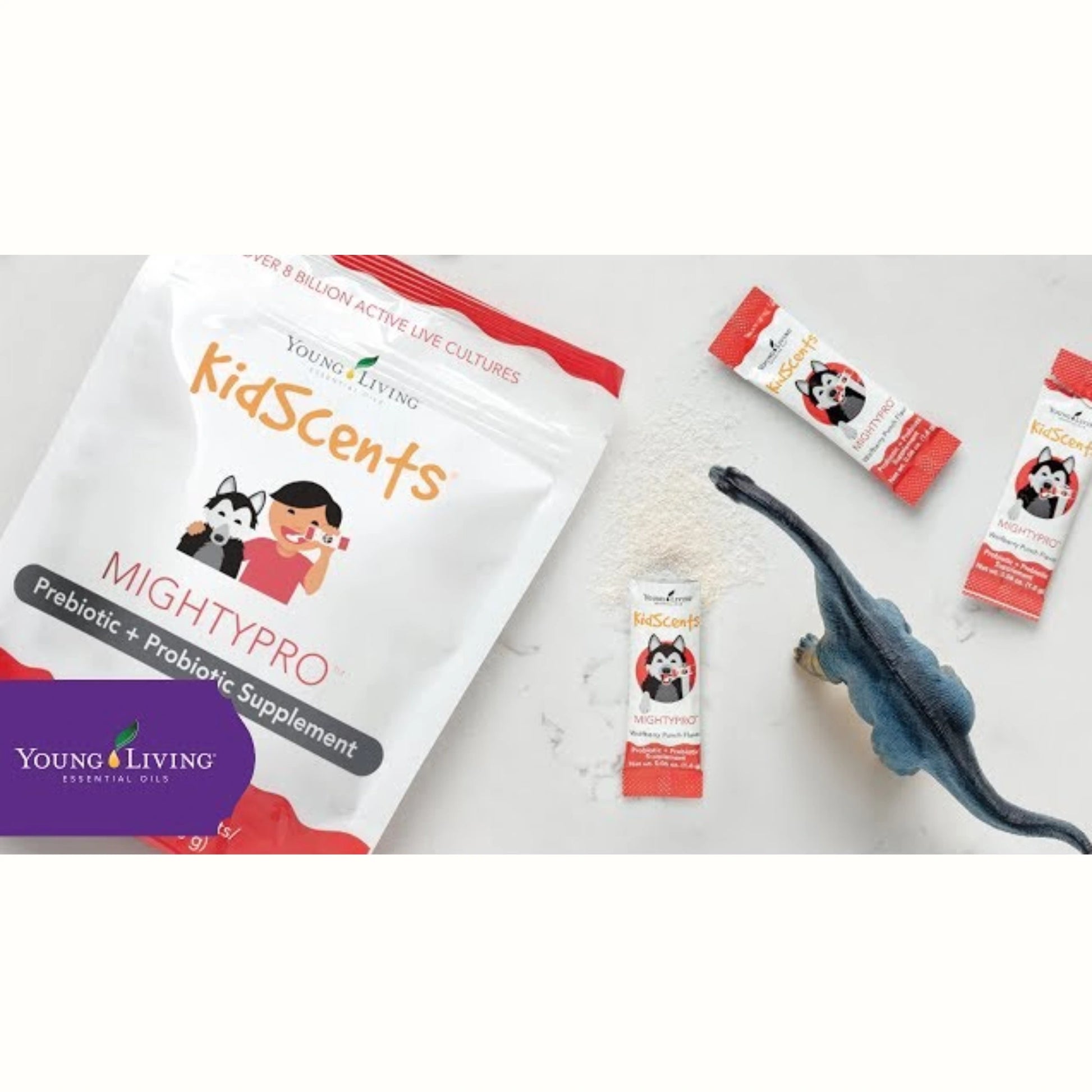 MightyPro poeder van Young Living met dinosaurus – leuke presentatie van probiotica voor kinderen met astma, ADHD en spijsverteringsproblemen.