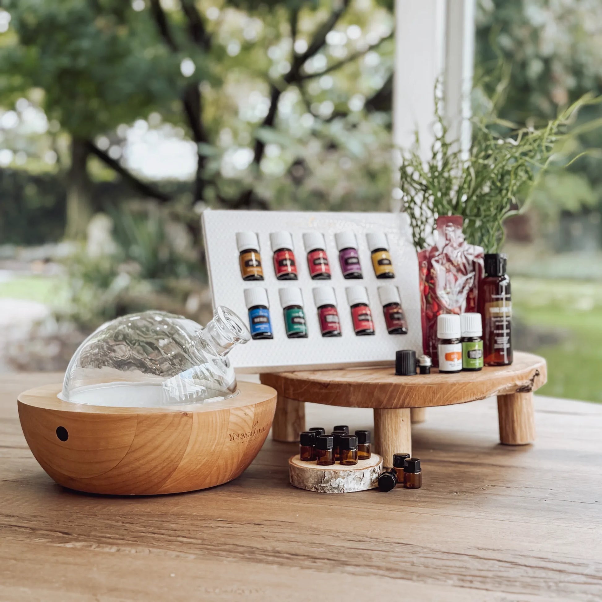 Luxe starterbundle van Young Living met Aria diffuser en essentiële oliën, ideaal voor vrouwen die stijlvol willen starten met aromatherapie en meer ontspanning zoeken