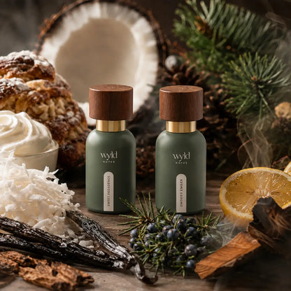 Sweet Decadence en Smokey Ember als warm Wyld Notes layering duo met vanille en houtachtige noten.