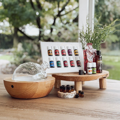 Luxe starterbundle van Young Living met Aria diffuser en essentiële oliën, ideaal voor vrouwen die stijlvol willen starten met aromatherapie en meer ontspanning zoeken